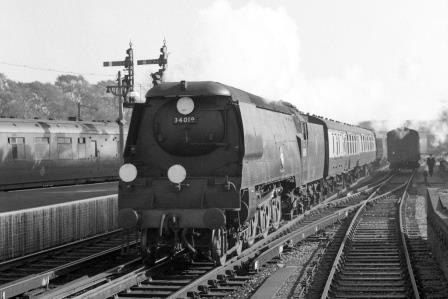 BR(S) West Country class 34019 'Bideford' at Hove Station, East Sussex with the 11.30am Brighton - Plymouth service on Saturday 01 Nov 1958 - J.H.W. Kent [150450]
