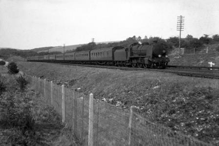BR(S) N class at Patcham, East Sussex with an Inter Regional - Brighton via Kensington Olympia service on Friday 08 Jul 1949 - J.H.W. Kent [152818]