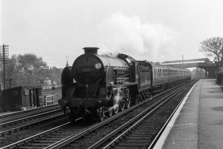BR(S) King Arthur class 30755 'The Red Knight' at Raynes Park Station, Greater London with a Waterloo - Basingstoke service on Saturday 26 Apr 1952 - J.H.W. Kent [153354]