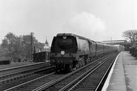BR(S) Merchant Navy class 35014 'Nederland Line' at Raynes Park Station, Greater London with a Waterloo - West of England service on Saturday 26 Apr 1952 - J.H.W. Kent [153360]
