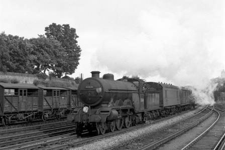 BR(S) Brighton Atlantic class 32424 'Beachy Head' near Preston Park Pullman Car Works, Brighton, East Sussex with a Northbound vans on Wednesday 01 Jul 1953 - J.H.W. Kent [153986]