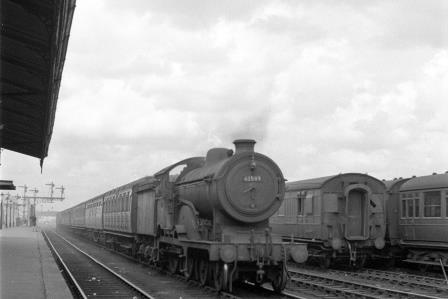BR(E) D16 class 62589 at Cambridge Station, Cambridgeshire with a Southbound Passenger on Saturday 18 Jul 1953 - J.H.W. Kent [154000]