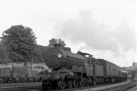 BR(S) Brighton Atlantic class 32426 'St. Alban's Head' passing Preston Park Pullman Car Works, East Sussex with a Northbound Vans on Friday 07 Aug 1953 - J.H.W. Kent [154016]