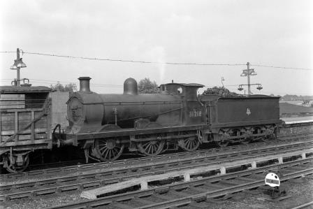 BR(S) C class 31218 at Ashford Station, Kent with an Eastbound Cattle Wagons on Saturday 19 Jun 1954 - J.H.W. Kent [154493]