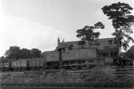 BR(W) 7200 class 7205 at Salisbury, Wiltshire with a Coal wagons on Wednesday 14 Jul 1954 - J.H.W. Kent [154646]