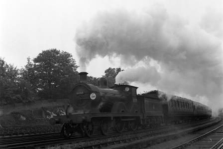 BR(S) D class 31737 passing Preston Park Pullman Car Works, East Sussex with a Hastings - Brighton - Birkenhead service on Wednesday 18 Aug 1954 - J.H.W. Kent [154673]