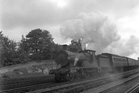 BR(S) E class 31166 passing Preston Park Pullman Car Works, East Sussex with a Hastings - Brighton - Birkenhead service on Thursday 19 Aug 1954 - J.H.W. Kent [154709]