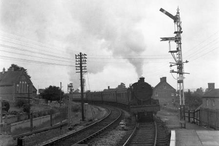BR(M) 7F class 53800 approaching Templecombe (Upper) Station, Somerset with a service from Somerset & Dorset line on Saturday 21 Aug 1954 - J.H.W. Kent [154714]