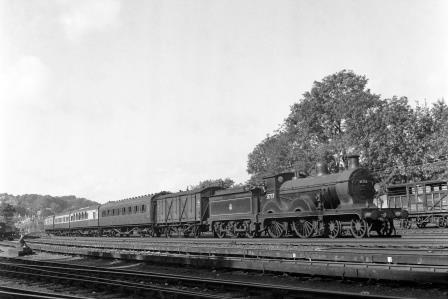 BR(S) D class 31737 passing Preston Park Pullman Car Works, East Sussex with a Birkenhead - Brighton - Hastings service on Tuesday 07 Sep 1954 - J.H.W. Kent [154744]