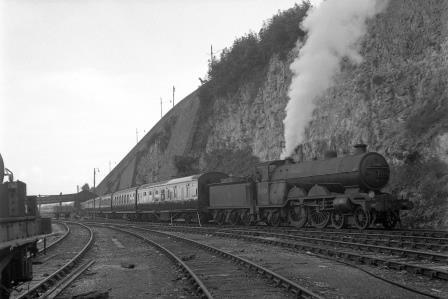 BR(S) Brighton Atlantic class 32424 'Beachy Head' near Preston Park Pullman Car Works, Brighton, East Sussex with an Empty LMR Stock on Friday 17 Sep 1954 - J.H.W. Kent [154755]