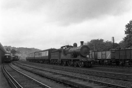 BR(S) E class 31166 passing Preston Park Pullman Car Works, East Sussex with a Birkenhead - Brighton - Hastings service on Friday 01 Oct 1954 - J.H.W. Kent [154800]