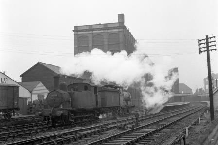 BR(E) J69 class 68573 & BR(E) J17 class 65530 at Stratford Market Station, Greater London on Saturday 06 Nov 1954 - J.H.W. Kent [154832]