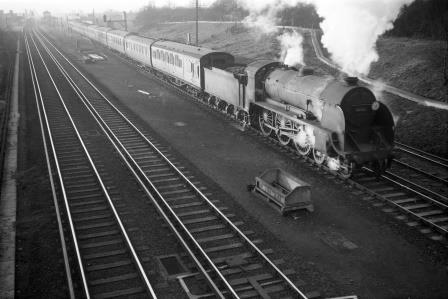 BR(S) King Arthur class 30765 'Sir Gareth' at New Malden, Greater London with the 12.50pm Salisbury - Waterloo service circa 1960 - D. Esau [155061]