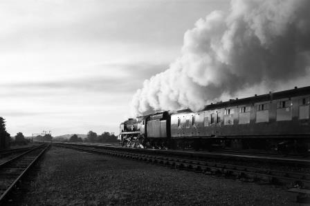 BR MN class at Brookwood, Surrey with a Waterloo - Bournemouth service on Saturday 10 Oct 1964 - D. Esau [155198]