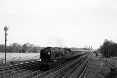 BR(S) West Country class 34101 'Hartland' near Fleet, Hampshire with a Waterloo - Bournemouth service on Saturday 13 Mar 1965 - D. Esau [155208]