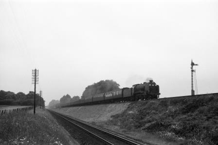 BR V class at Battledown Flyover, Hampshire with a Lymington Pier - Waterloo service on Saturday 17 Jun 1961 - D. Esau [155237]