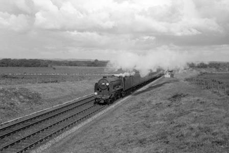 BR V class near Brockenhurst, Hampshire with a Waterloo - Bournemouth service on Saturday 19 Aug 1961 - D. Esau [155238]