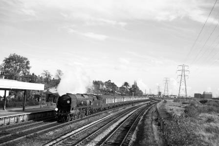 BR(S) Merchant Navy class 35024 'East Asiatic Company' at Millbrook Station, Hampshire with the down "Bournemouth Belle" on Saturday 03 Nov 1962 - D. Esau [155256]