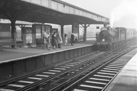 BR(S) 0395 class 30567 at Wimbledon Station, Greater London with a The Portsmouth Direct Line Centenarian on Sunday 25 Jan 1959 - D. Esau [155311]