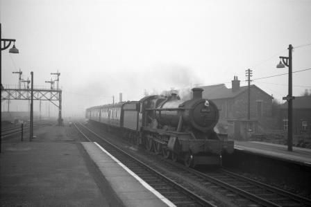 BR Modified Hall class 6968 'Woodcock Hall' at Basingstoke Station, Hampshire with a Southampton - Reading General service on Tuesday 21 Feb 1961 - D. Esau [155392]