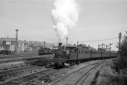 BR(S) O2 class W22 'Brading' at Ryde St Johns Road, Isle of Wight with a Ryde Pier Head - Ventnor service on Friday 15 May 1964 - D. Esau [155515]