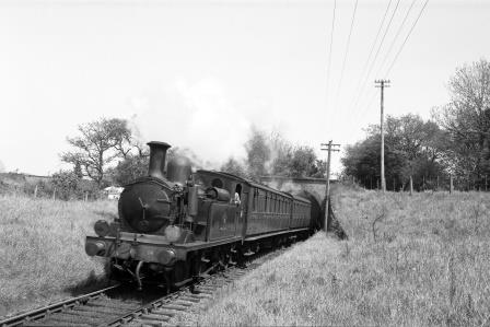 BR(S) O2 class W14 'Fishbourne' near Ashey, Isle of Wight with a Ryde Pier Head - Cowes service on Friday 15 May 1964 - D. Esau [155582]