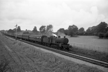 BR(M) 7F class 53806 near Midsomer Norton, Somerset with an Inter Regional service on Saturday 13 Aug 1960 - D. Esau [155631]