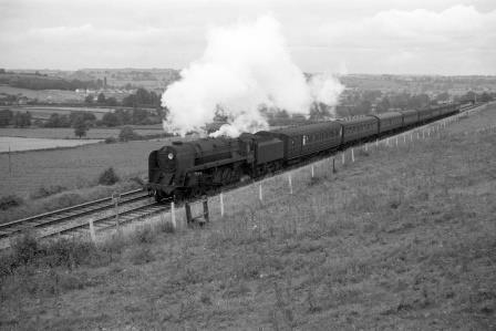 BR 9F class 92203 near Midsomer Norton, Somerset with an Inter Regional service on Saturday 13 Aug 1960 - D. Esau [155643]
