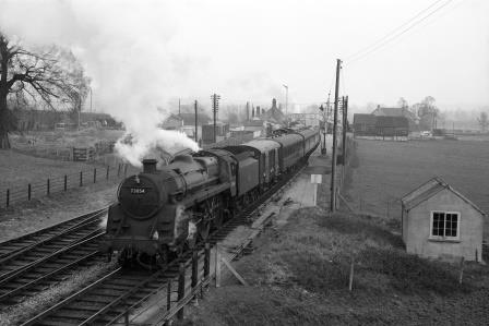 BR Std 5MT class 73054 at Evercreech Junction, Somerset with a Northbound service on Saturday 03 Apr 1965 - D. Esau [155688]