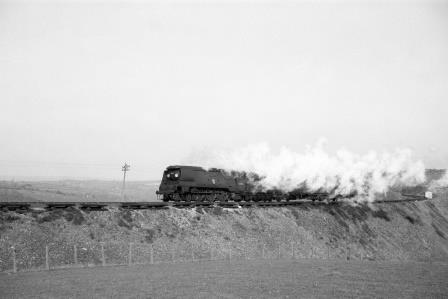 BR(S) Battle of Britain class 34065 'Hurricane' near Ashwater, Devon with a Padstow train? in Apr 1960 - D. Esau [155768]