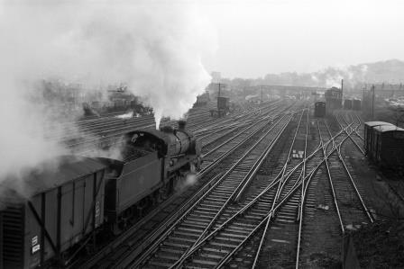 BR(S) N class 31858 at Guildford, Surrey with a Freight train from Reading on Wednesday 01 Jan 1964 - D. Esau [156100]