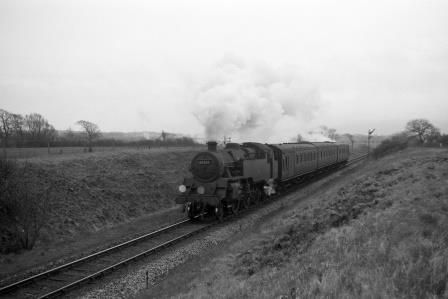 BR Std 4MT class 80013 near Hailsham, East Sussex with a Tunbridge Wells West to Eastbourne train or vv circa 1959 - D. Esau [156390]