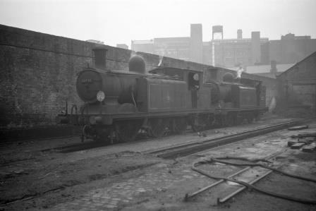 BR(S) E4 class 32474 & BR(S) E4 class 32557 at Bricklayers Arms Shed, Greater London circa 1955 - D. Esau [156691]