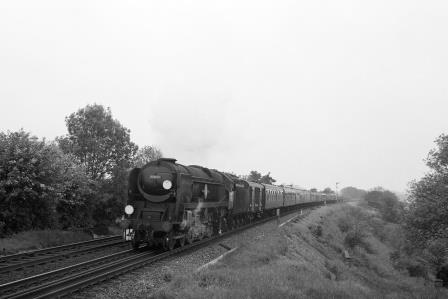 BR(S) Merchant Navy class 35010 'Blue Star' near Micheldever?, Hampshire with a down Bournemouth service circa 1966 - D. Esau [156720]