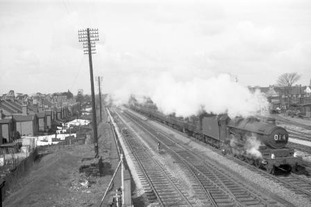BR(W) Castle class at West Ealing, Greater London with an up Express from Paddington service in the 1960s - D. Esau [156855]