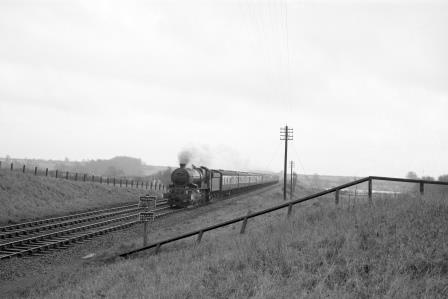 BR(W) King class 6002 'King William IV' near Haddenham, Buckinghamshire with the down "Cambrian Coast Express" on Monday 08 Jan 1962 - D. Esau [156952]
