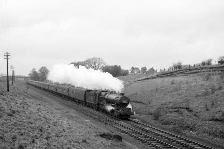 BR(W) King class near Haddenham, Buckinghamshire with a Birmingham - Paddington service on Monday 08 Jan 1962 - D. Esau [156956]