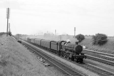 BR(W) Hall class 4903 'Astley Hall' at Moreton-in-Marsh, Gloucestershire with an up Parcels service on Saturday 27 Jun 1964 - D. Esau [157085]