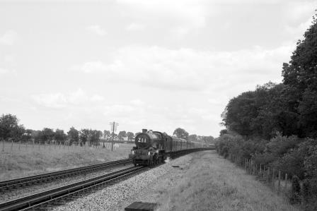 BR(W) King class at Aldermaston troughs, Berkshire with a down Race Special service on Saturday 18 Aug 1962 - D. Esau [157263]