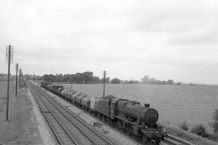 BR(M) 8F class 48402 near Standish Junction, Gloucestershire with a Freight in the 1960s - D. Esau [157972]