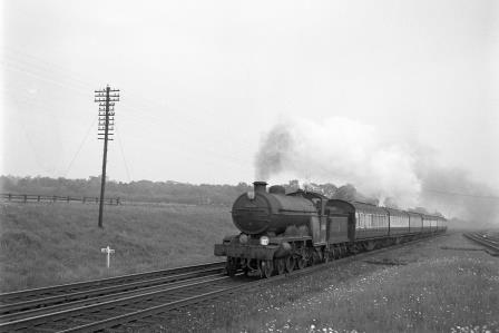 BR(S) Brighton Atlantic class 32426 'St. Alban's Head' at Salfords, Surrey with an up Inter Regional service circa 1954 - C.A.K. Saunders [159139]
