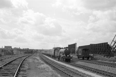 BR(S) Brighton Atlantic class 32424 'Beachy Head' leaving Clapham Junction on West London line, Greater London with an up Inter Regional service circa 1956 - C.A.K. Saunders [159194]