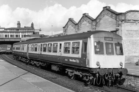 BR(E) Class 101 E54218 at Keighley Station, Yorkshire with the 10.30am Keighley - Bradford Forster Square service on Monday 25 Mar 1985 - J. Scrace [233662]