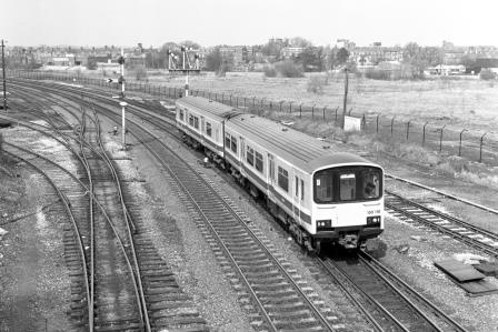 BR(W) Class 150 150110 at Sutton Bridge Junction, Shropshire with the 2.42pm Shrewsbury - Aberystwyth service on Friday 18 Apr 1986 - J. Scrace [233739]