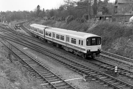 BR(W) Class 150 150143 at Sutton Bridge Junction, Shropshire with the 1.40pm Aberystwyth - Crewe service on Friday 18 Apr 1986 - J. Scrace [233740]