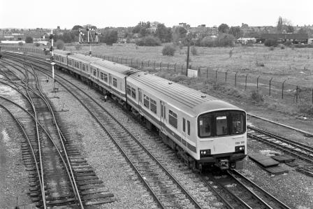 BR(W) Class 150 150110 at Sutton Bridge Junction, Greater London with the 2.50pm Shrewsbury - Aberystwyth service on Friday 23 May 1986 - J. Scrace [233748]