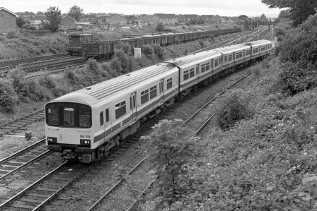 BR(W) Class 150 150102 at Sutton Bridge Junction, Greater London with the 1.35pm Aberystwyth - Shrewsbury service on Friday 04 Jul 1986 - J. Scrace [233758]