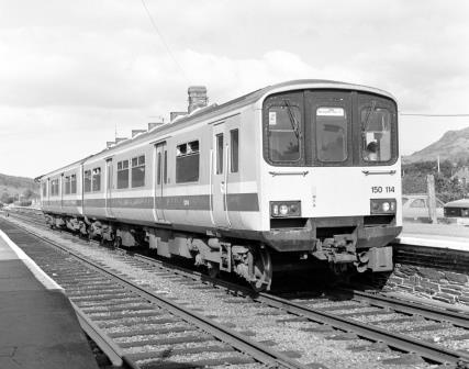 BR(W) Class 150 150114 at Porthmadog Station, Gwynedd with the 9.40am Pwhelli - Birmingham New Street service on Monday 24 Aug 1987 - J. Scrace [233781]