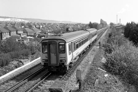 BR(S) Class 156 156448 at Portchester, Hampshire with the 2.10pm Portsmouth Harbour - Cardiff service on Tuesday 18 Apr 1989 - J. Scrace [233901]