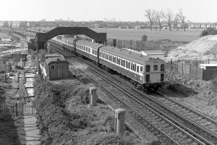 BR(S) Class 207 207010 at Hilsea, Hampshire with the 10.30am Portsmouth Harbour - Salisbury service on Tuesday 18 Apr 1989 - J. Scrace [233919]